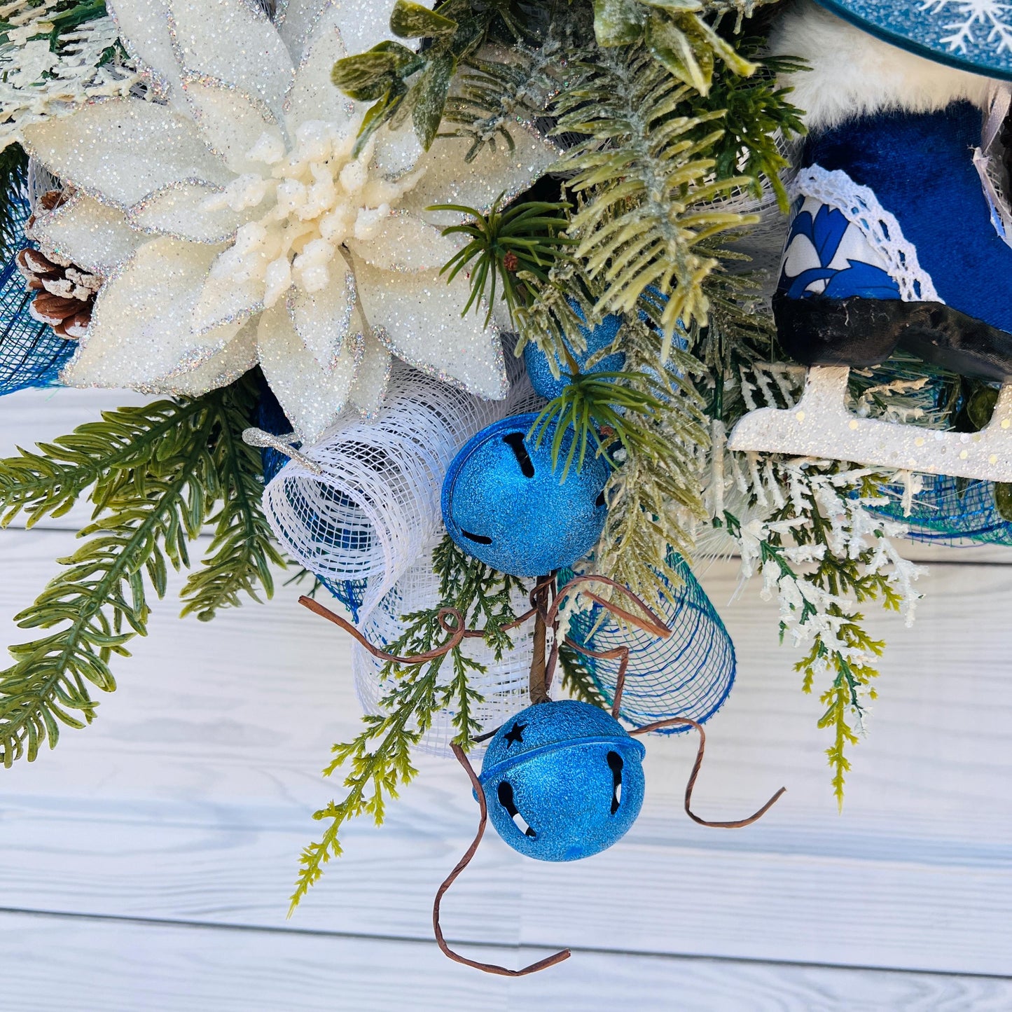Blue bell winter front door wreath, Christmas ornament decoration, holiday porch swag, pinecone, poinsettia, ice skate, jingle sleigh bells