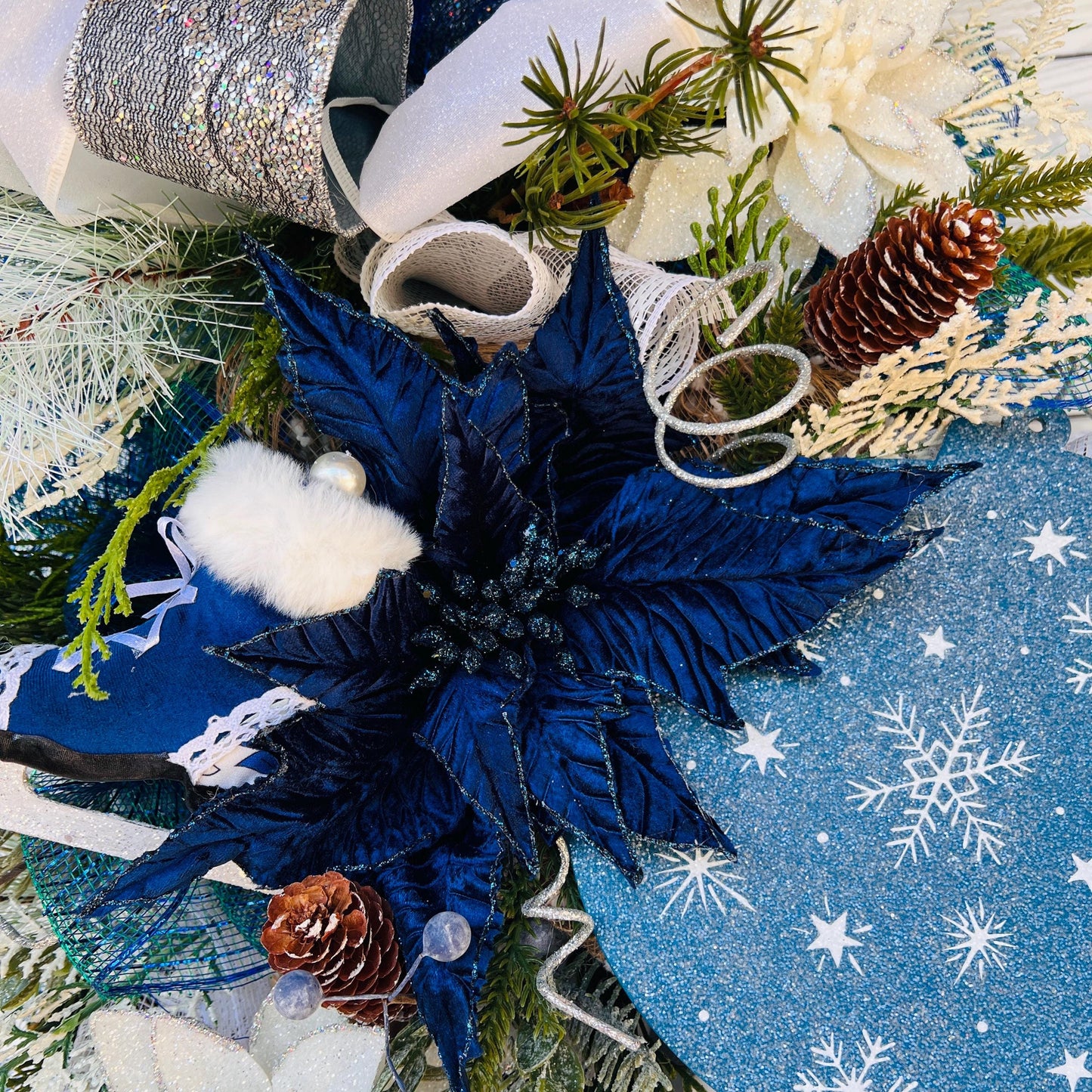 Blue bell winter front door wreath, Christmas ornament decoration, holiday porch swag, pinecone, poinsettia, ice skate, jingle sleigh bells