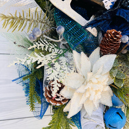 Blue bell winter front door wreath, Christmas ornament decoration, holiday porch swag, pinecone, poinsettia, ice skate, jingle sleigh bells