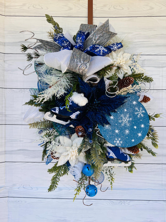 Blue bell winter front door wreath, Christmas ornament decoration, holiday porch swag, pinecone, poinsettia, ice skate, jingle sleigh bells