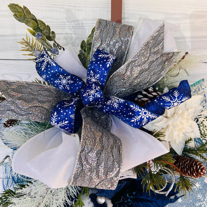 Blue bell winter front door wreath, Christmas ornament decoration, holiday porch swag, pinecone, poinsettia, ice skate, jingle sleigh bells