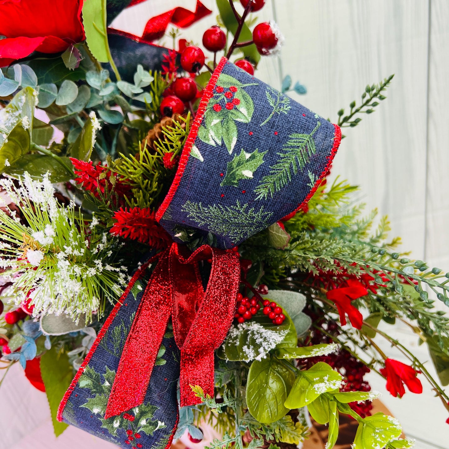Traditional Santa Christmas Centerpiece on Wooden Candlestick with Frosted Pine, Berries, Red Roses, Navy Winter Bow, Holiday Table Decor